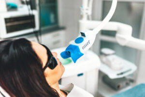 canva-teeth-whitening-in-dental-clinic-for-pretty-female-patient-MADJmacvo94-300×200